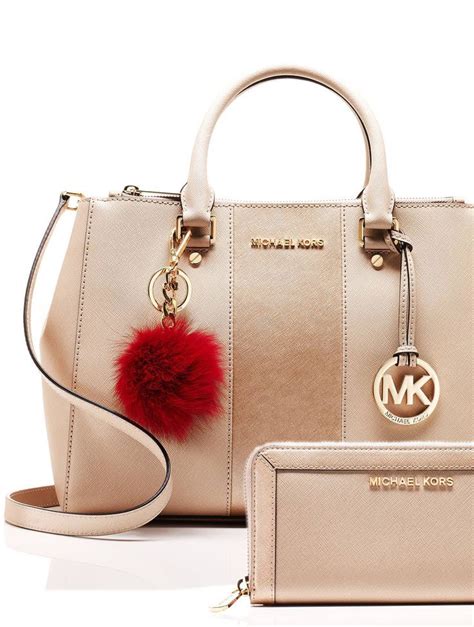 michael kors bag with pom pom|Michael Kors purses today.